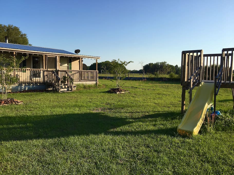 Front yard, play house & sandbox