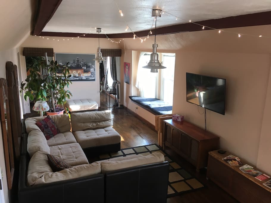 Living room with lots of seating including the window