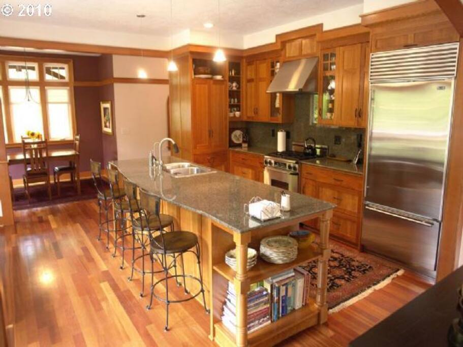 Sit on barstools at this granite tabletop while the adventuresome cook among you makes dinner.