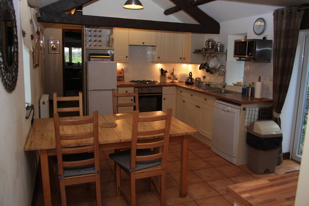kitchen dinning area with door to rear garden