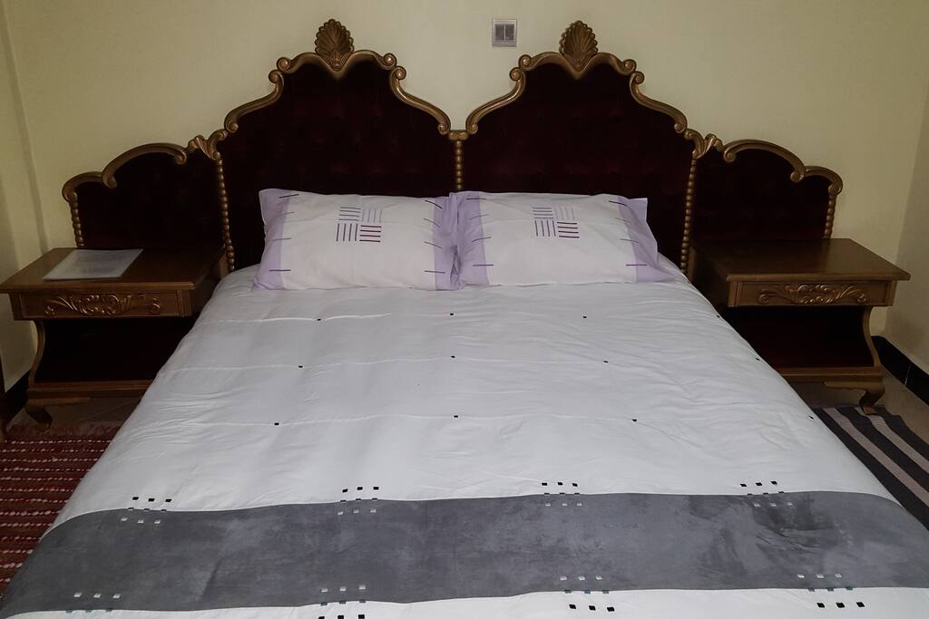 The Queen bed with Variety of linen to meet tastes and moods