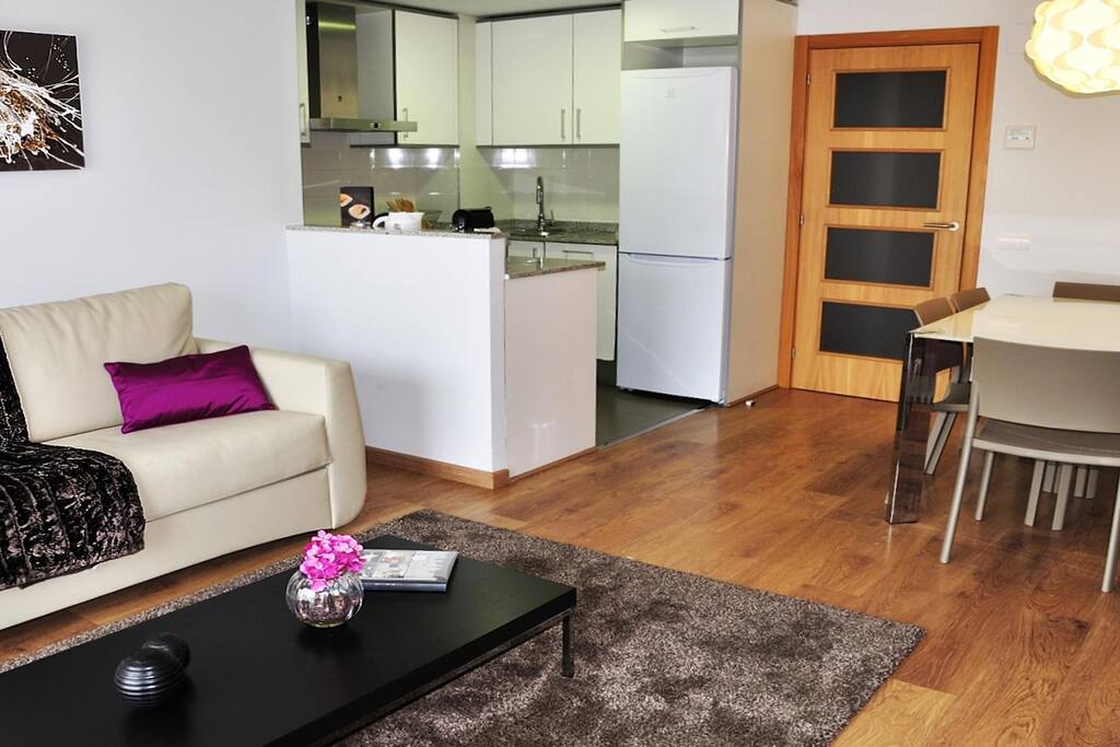 Enjoy having a cocktail or sharing a meal with your group at the gorgeous dining table.