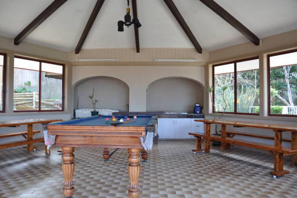 inside area of the gazebo with pool table