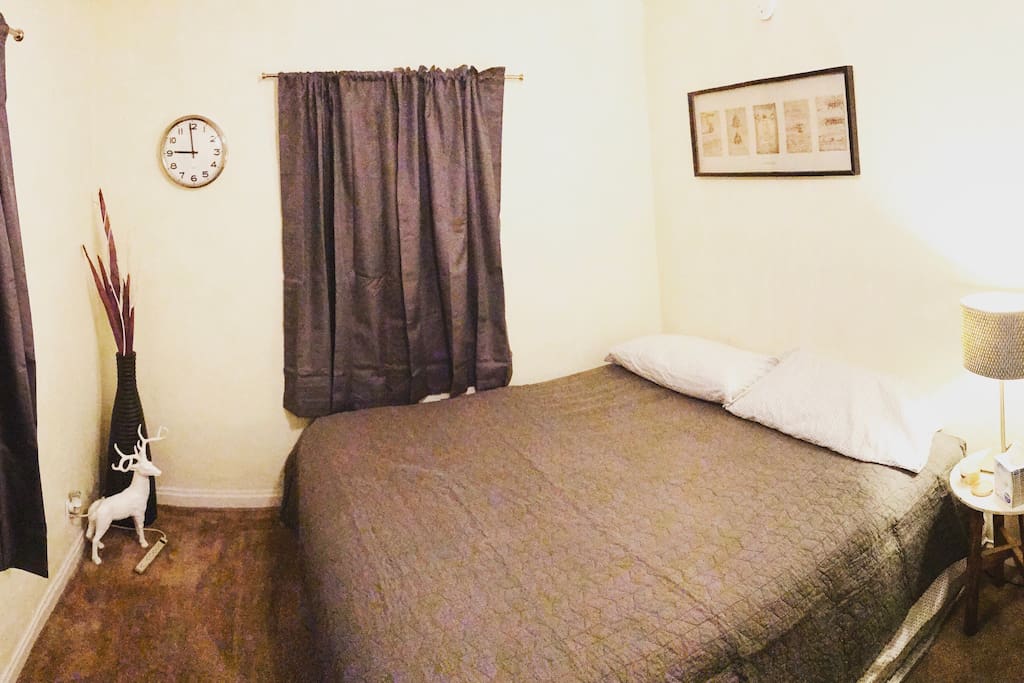 Your bedroom with a comfortable king size bed.