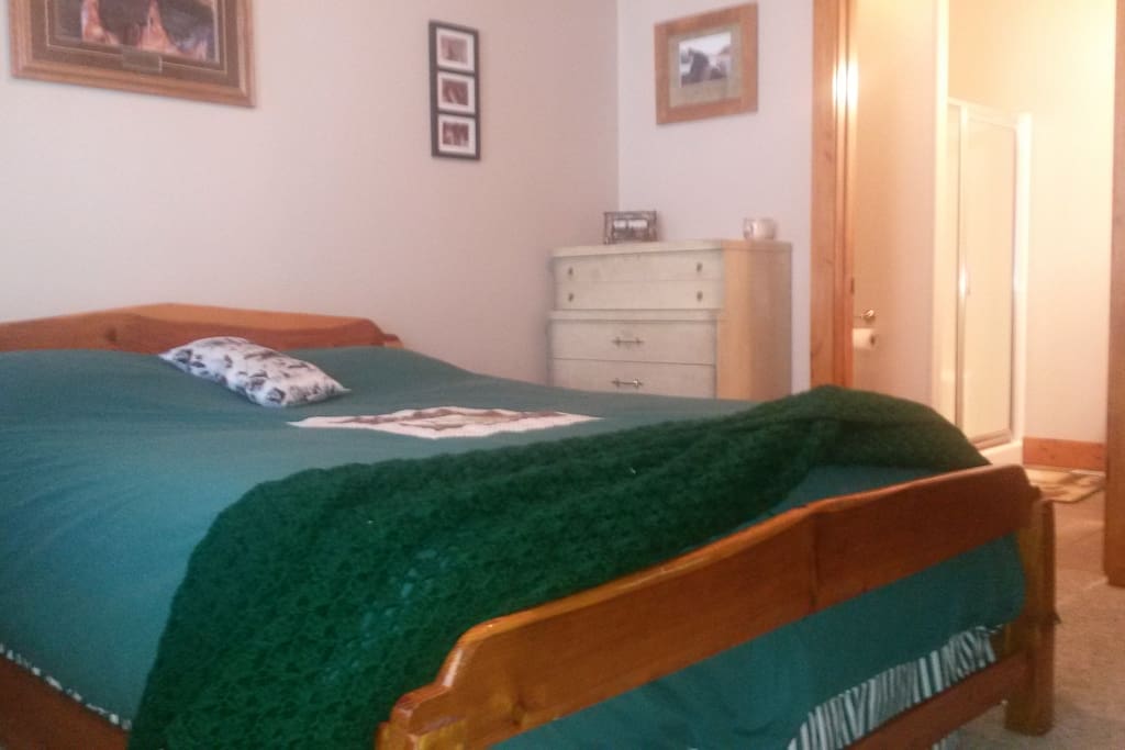 Queen bed with memory foam and down comforter. Private bathroom with shower.
