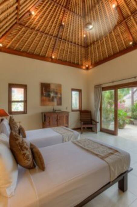 Upstairs bedroom opens to private terrace