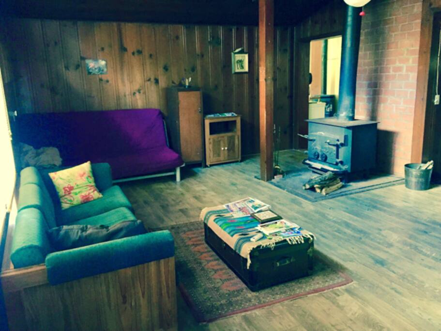 Living room with large wood burning stove