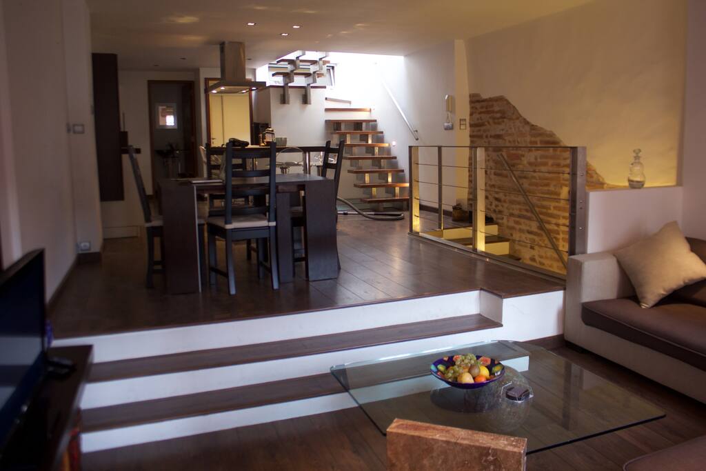 View of the dining room and kitchen from the living room