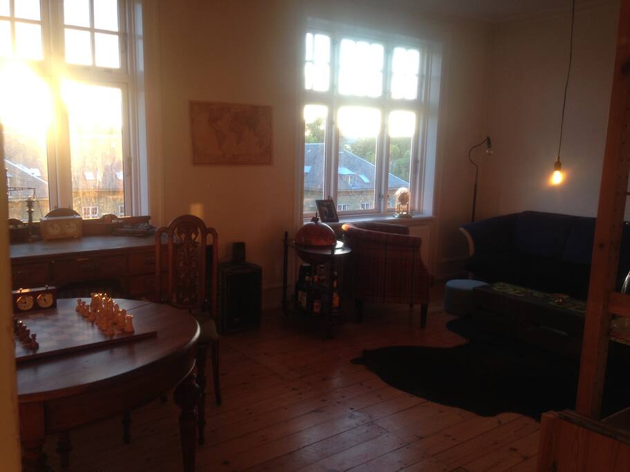 Whole view of the living room. The late evening sun puts a beautiful light in this room