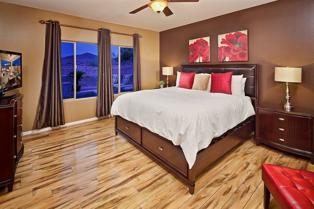 Luxurious master bedroom with mountain view.