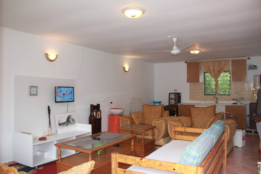 Open plan kitchen, and naturally lit interior during the day time.