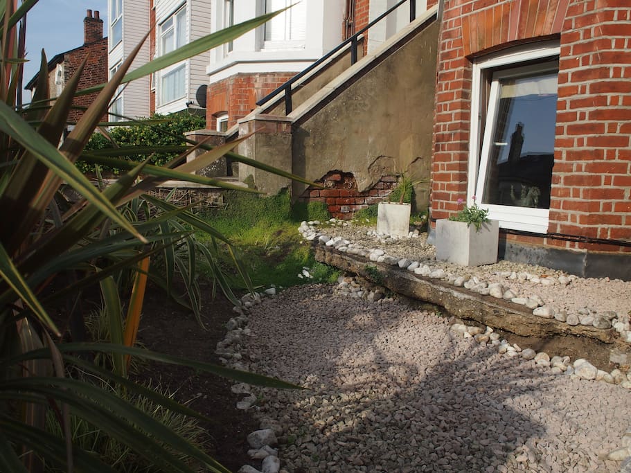 There is space at the front to have breakfast and lunch in full sun. You can shift the table and chairs from the back garden and leave them there if you wish. No one will take them away.