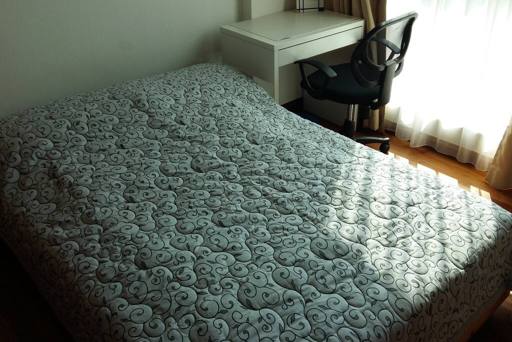 Private bedroom with desk for one guest