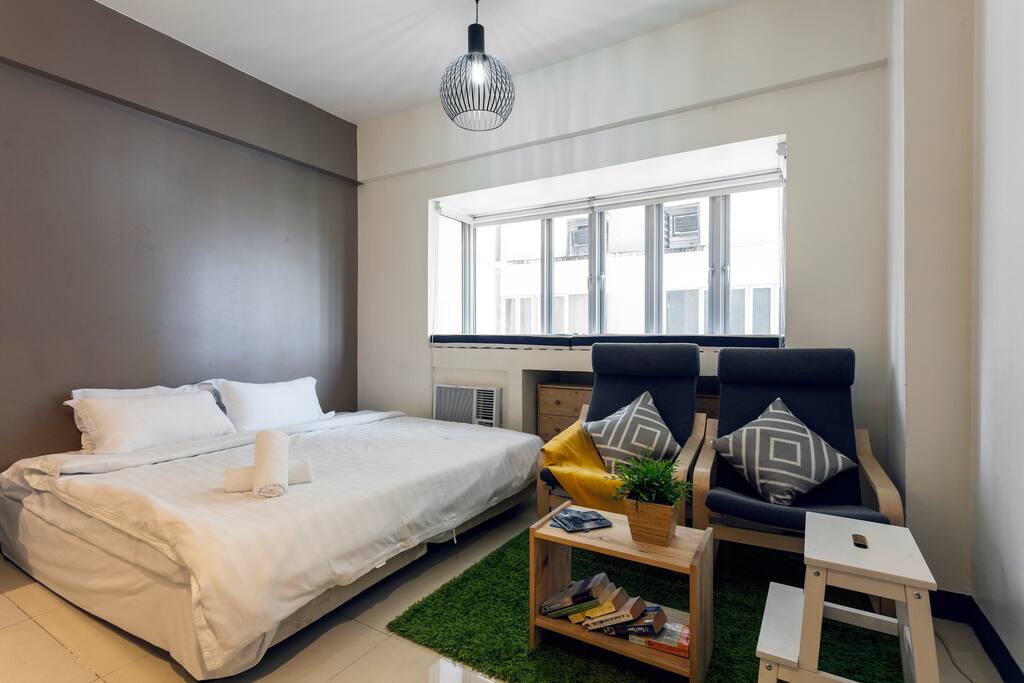 King size bed and seating on the right