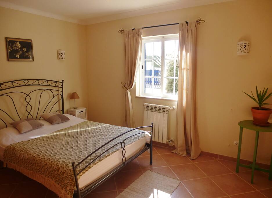 Papaya double bedroom with front garden view