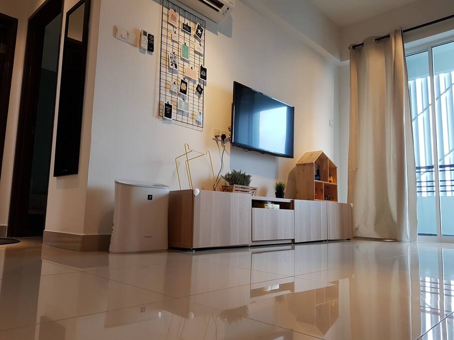 Spacious living room with air purifier for great comfort and fresh air