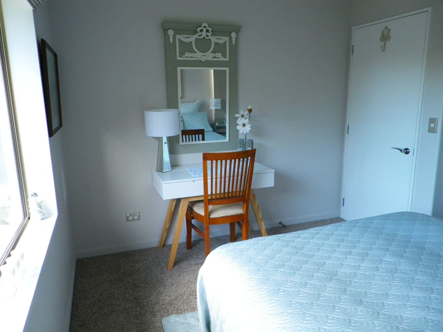 Desk in the room with good lighting and free Wifi