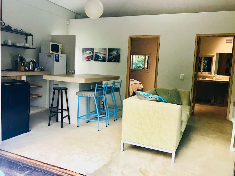 Unit 2:
This unit has an open plan kitchen and big double sliding doors that open out onto the covered patio.