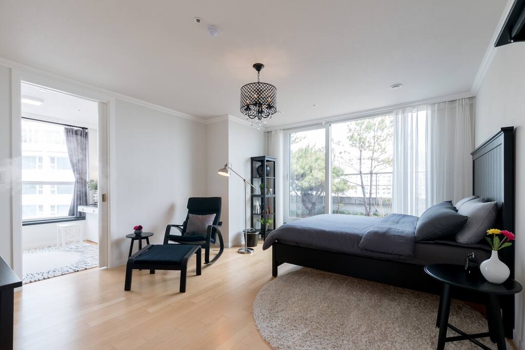 Large bedroom with an attached power room, dress room and the large bathroom