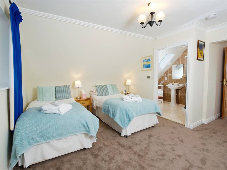 Rock room made up as a spacious twin bedded room