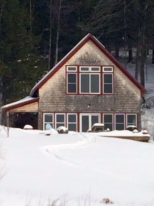 House with ski tracks in front yard!