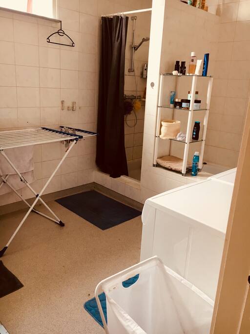 Bathroom with shower and bathtub