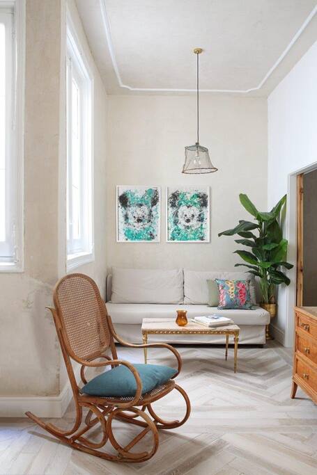 Living room with sofa bed in the background
