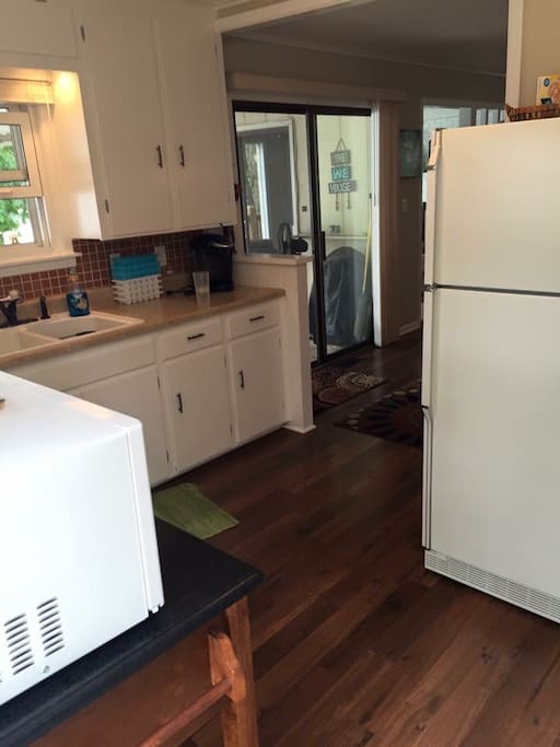 Kitchen is bright and clean. Everything you could possible want to cook some burgers or fix a gourmet meal.