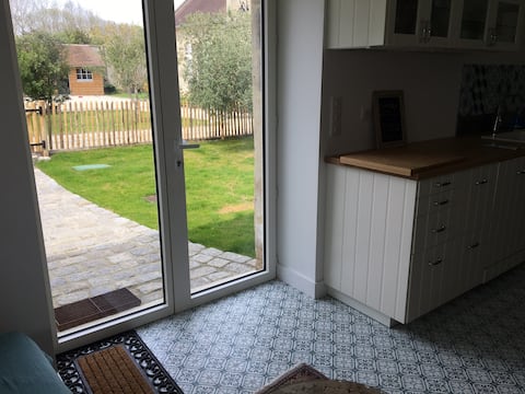 Popular Airbnb listing: Cozy cottage, garden, wood-burning stove, 250 m from the sea in Bernières Sur Mer