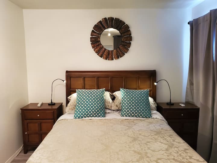 Bedroom with satelite TV and Air Conditioning.