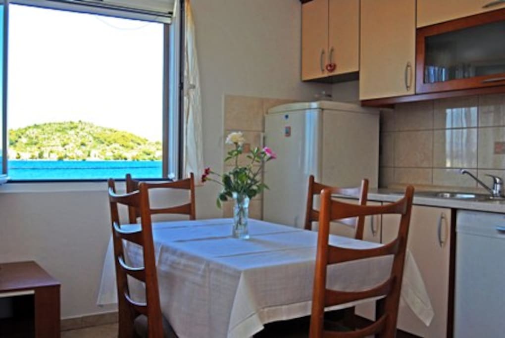 Kitchen with a view to Osljak- smallest inhabitet island of the Adriatic sea