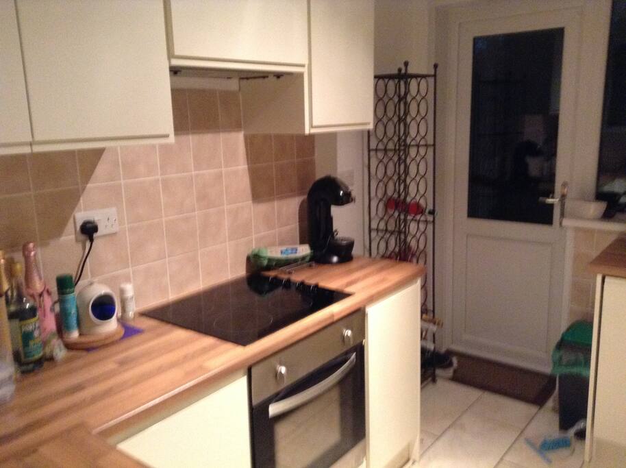 Kitchen leading to back garden
