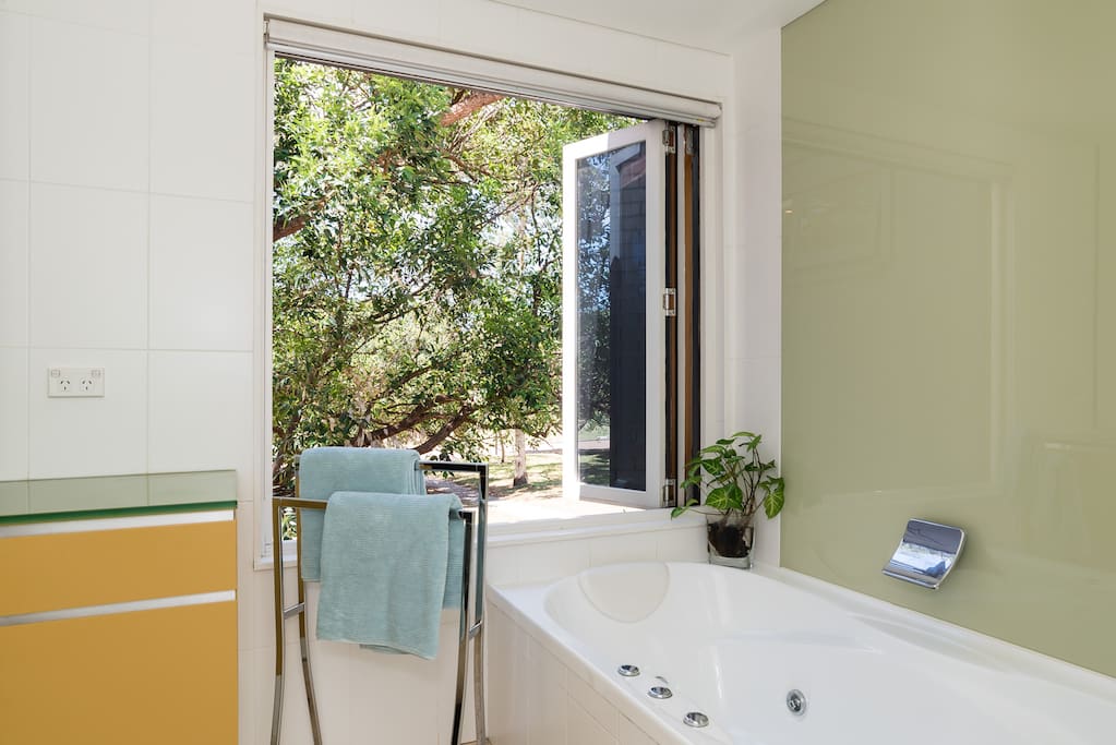 Taking a bath in this luxurious house in the trees is no longer a dream