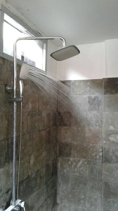 Large Private Bathroom w/ Hot Water Shower.