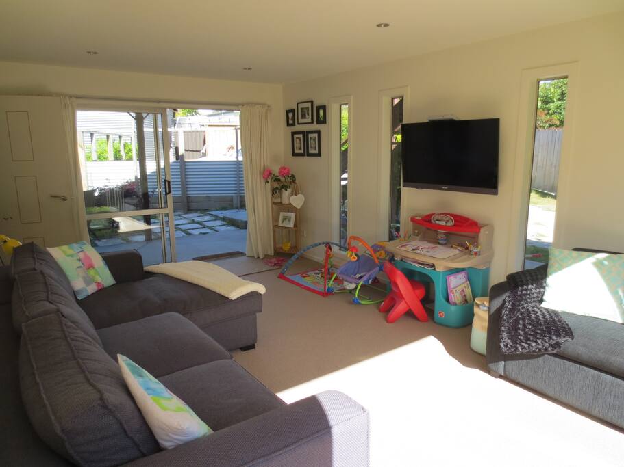 Comfortable couch and tv watching area.