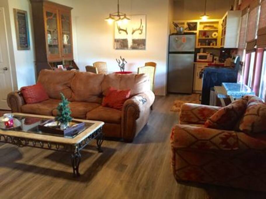 Third room inside the Barn Quarters. Queen size pullout couch and open kitchen