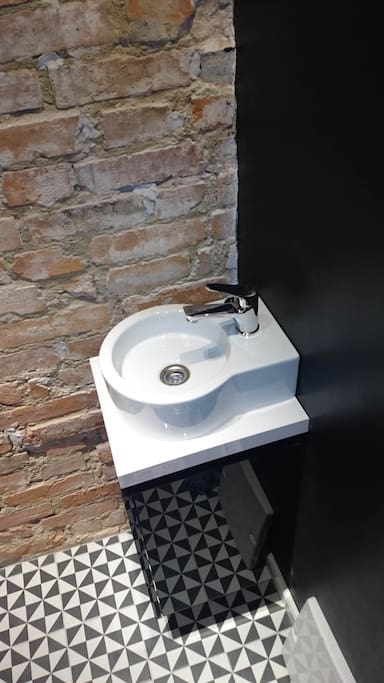 Little sink in toilet