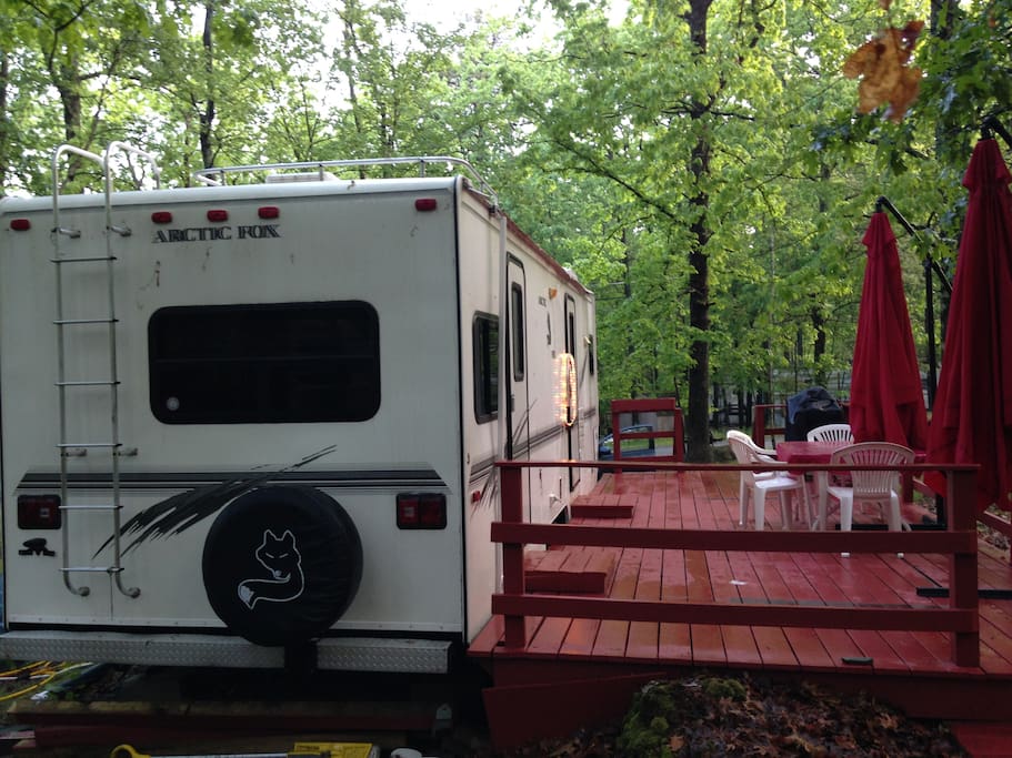 View of the Travel Trailer with deck from the back