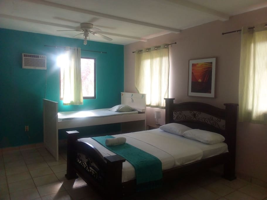 Spacious double bed with single on the side