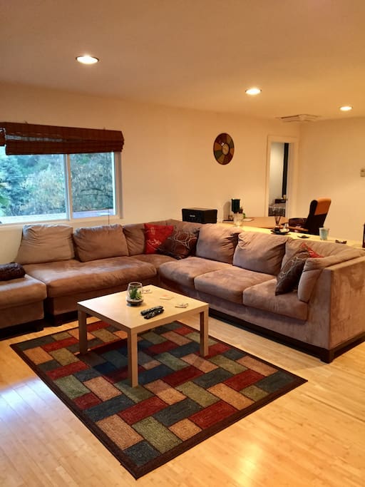 Large family room with microfiber suede large sectional couch