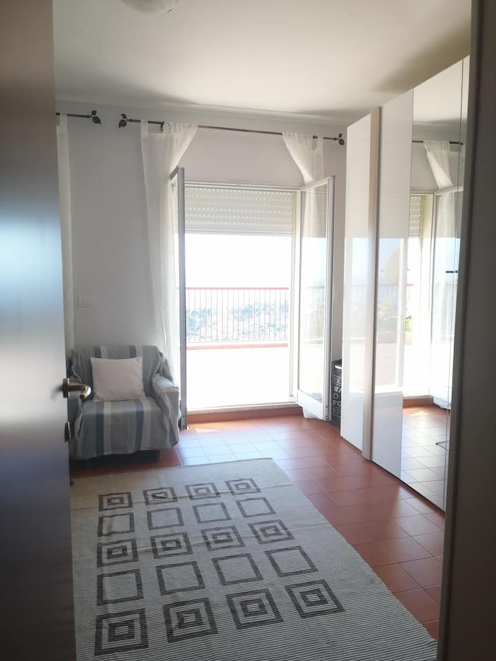 Dormitorio con acceso a la terraza privada 