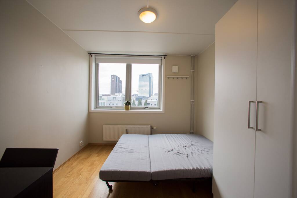 Inside the bedroom with full size bed