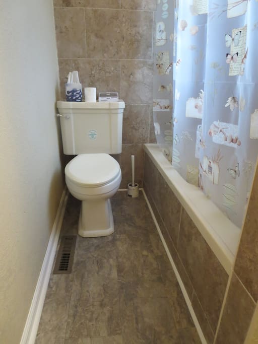Tiled bathtub.