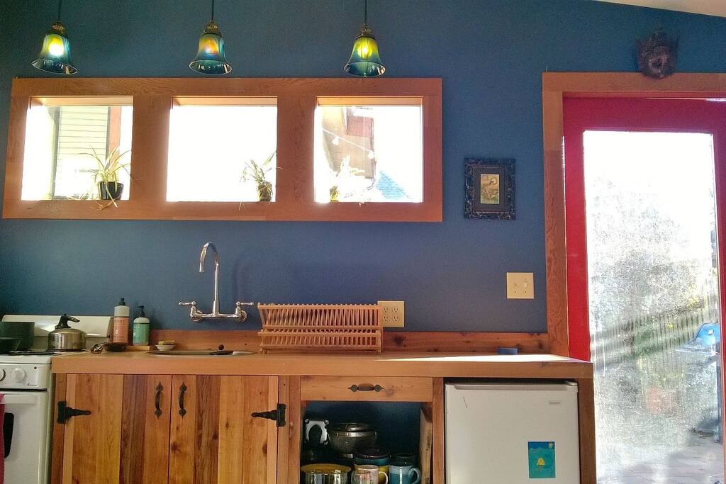 Brand new all-natural wood kitchen with oven, stove and refrigerator