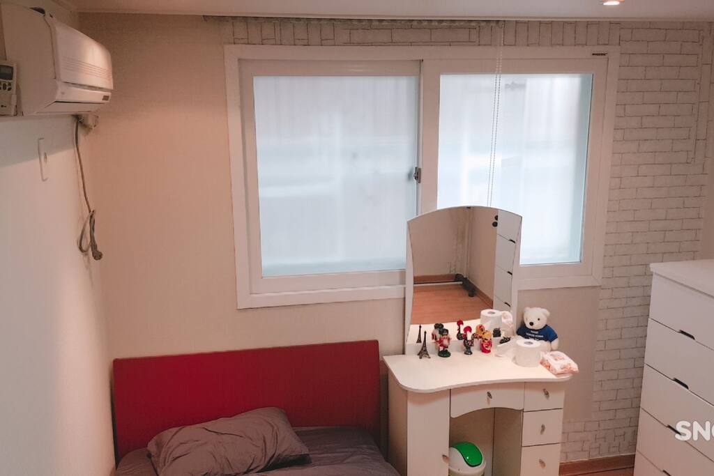 Big window and Air conditioner in the guest room