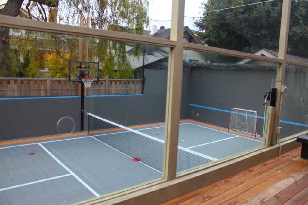 This is the back deck and court. The back deck has a gas barbeque and sitting for a family.