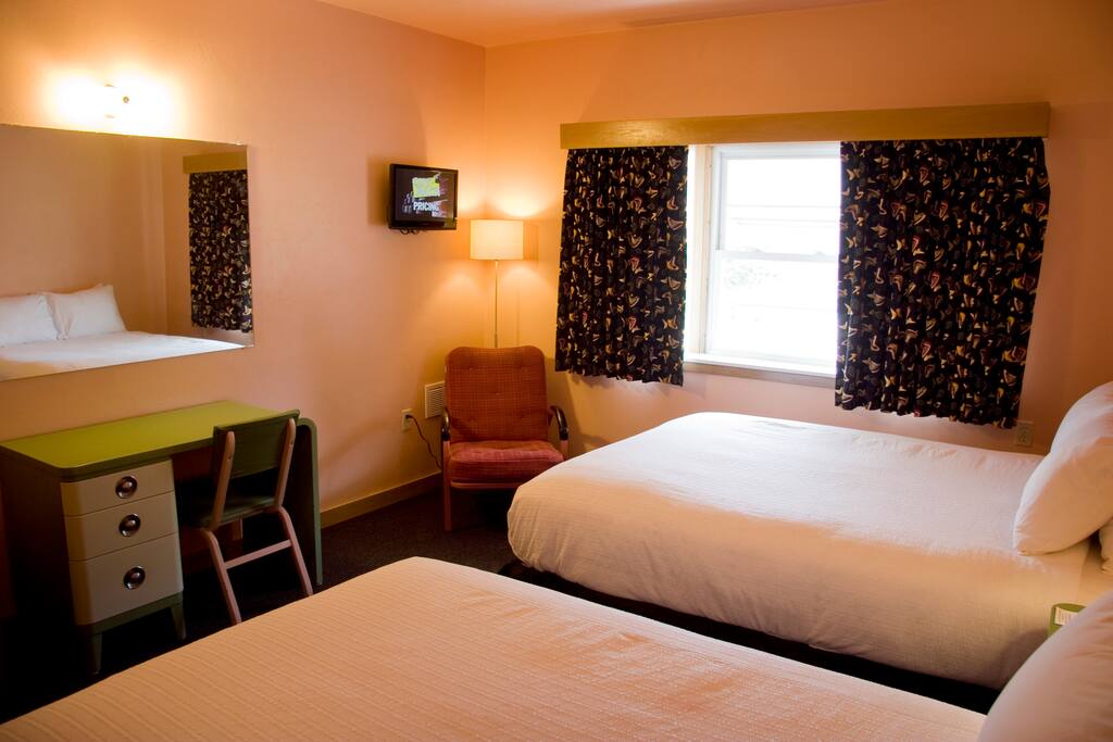 One Queen and one full bed. Can accommodate up to 4 people ($10 per person over 2 people in room)