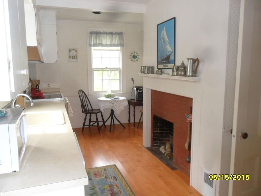 Fully appliance kitchen with decorative fireplace