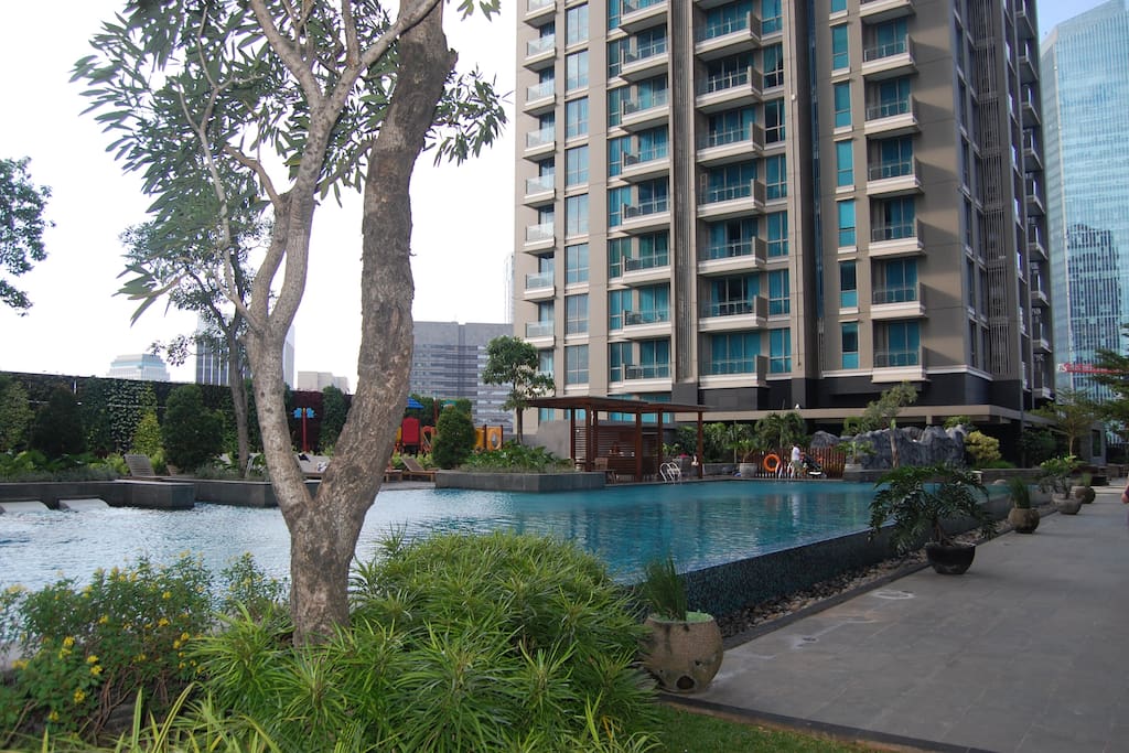 Huge lap pool with children playground and other great facilities