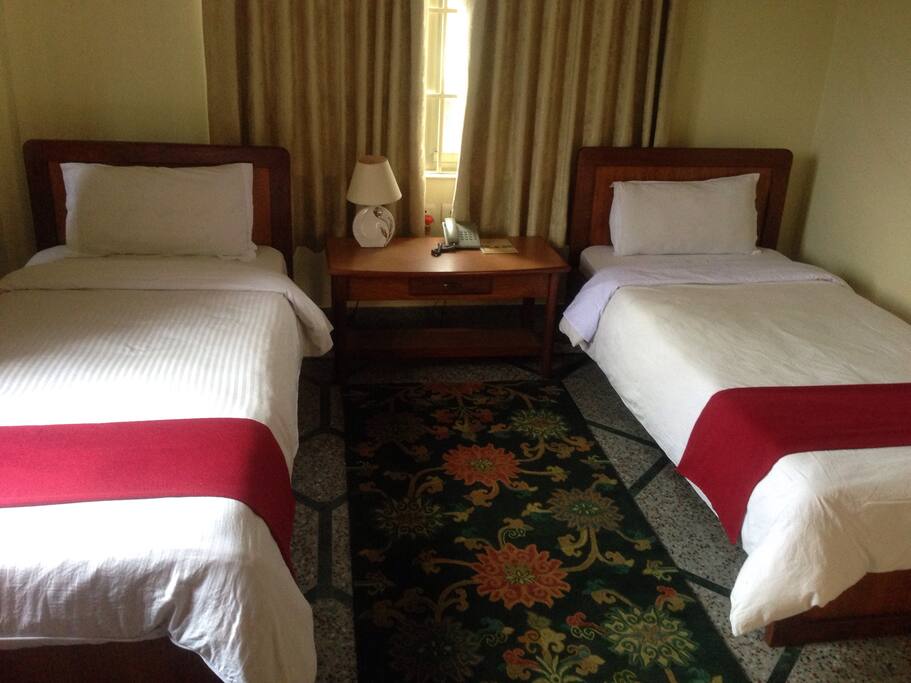 1 pax - Single Room with attached bathroom. 2 pax - Twin Room with attached bathroom.